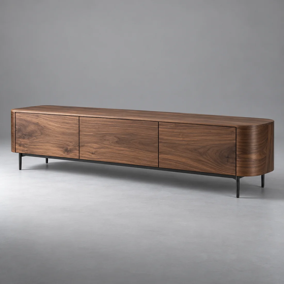 Line walnut media console on slim black legs